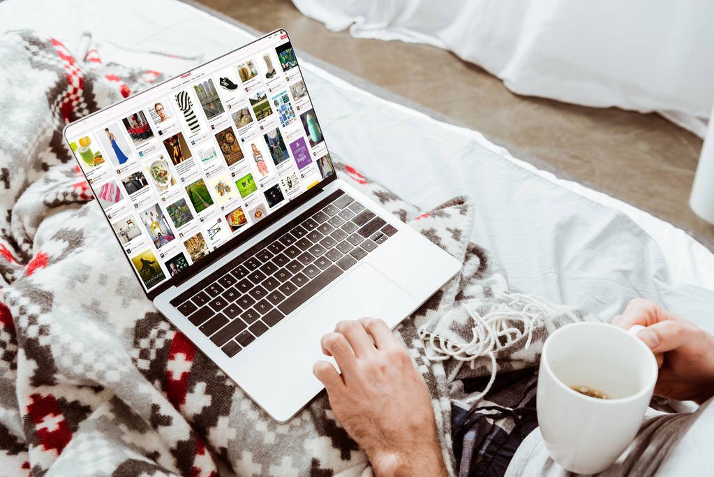 stock photo cropped image man holding coffee