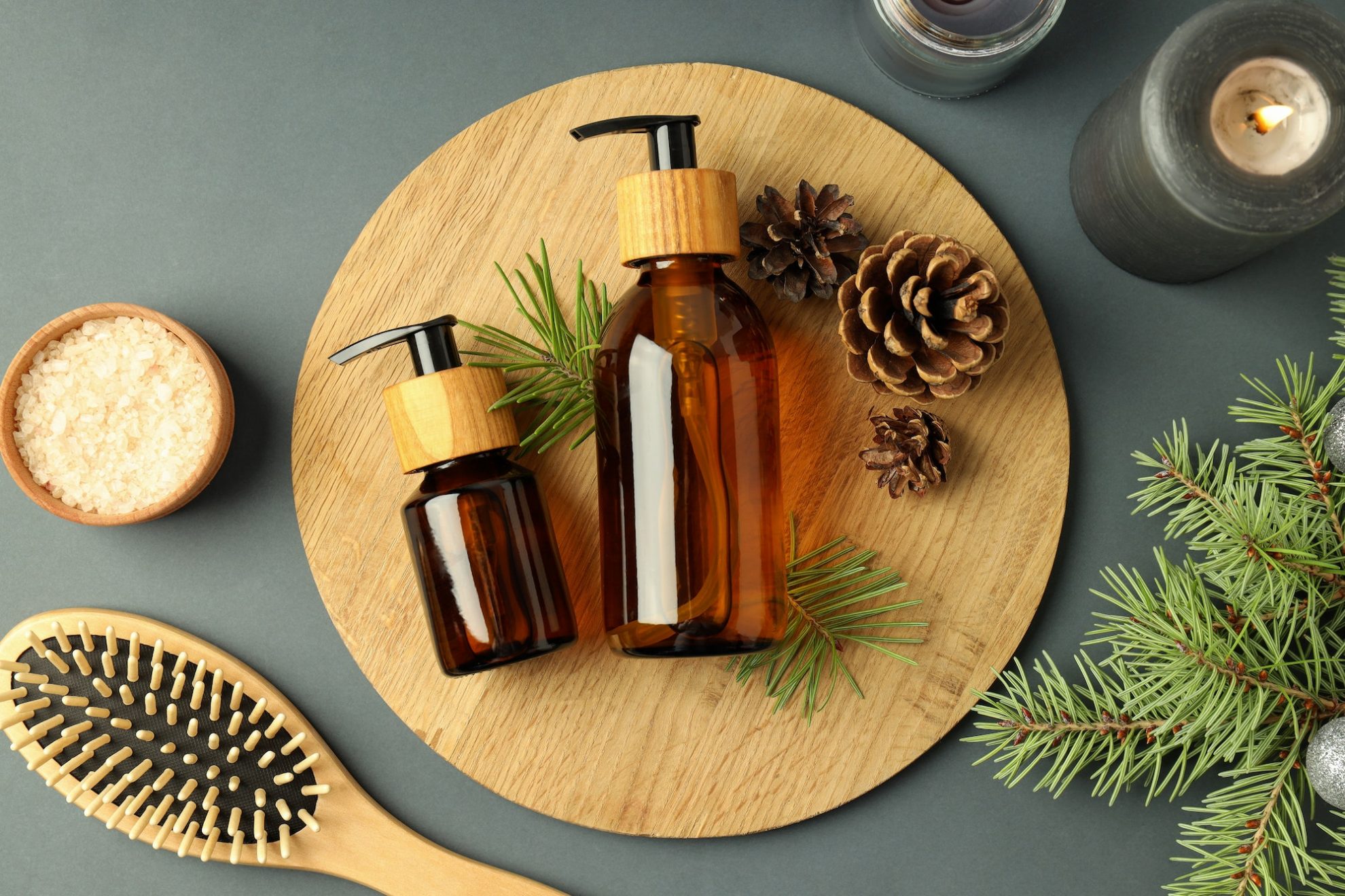 composition with winter cosmetic products on light gray background