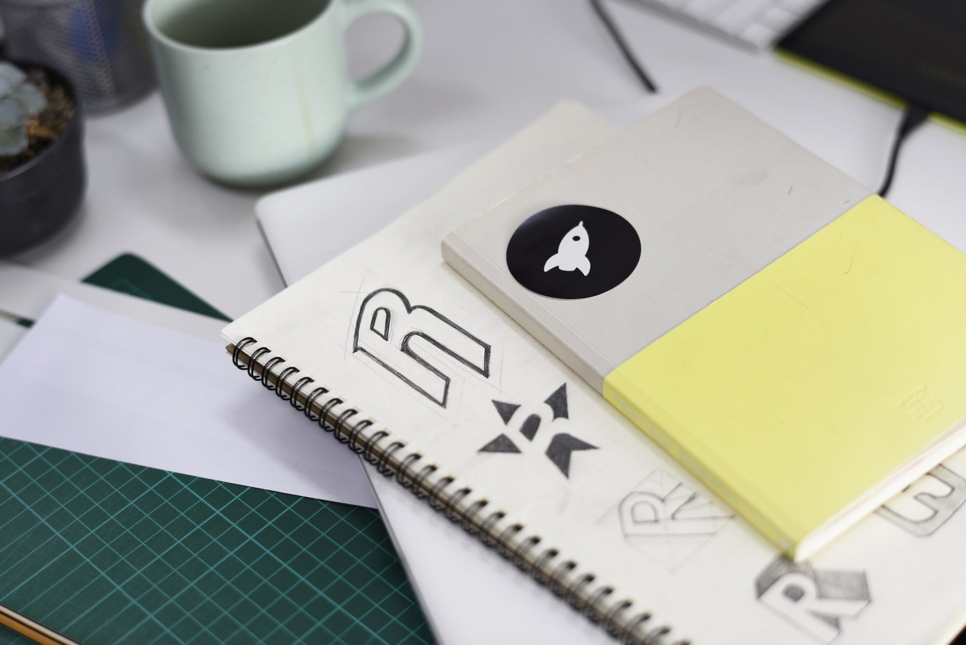 notebook with brand logo creative design ideas