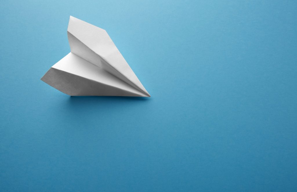 Travel plane concept.Mockup design of travel concept with plane on blue color background